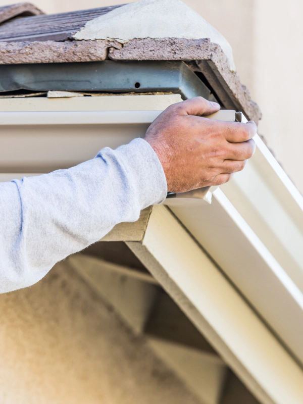 contractor during a gutter installation