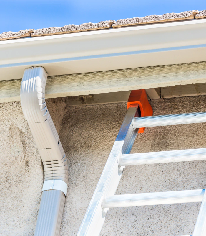 ladder next to a gutter during an installation